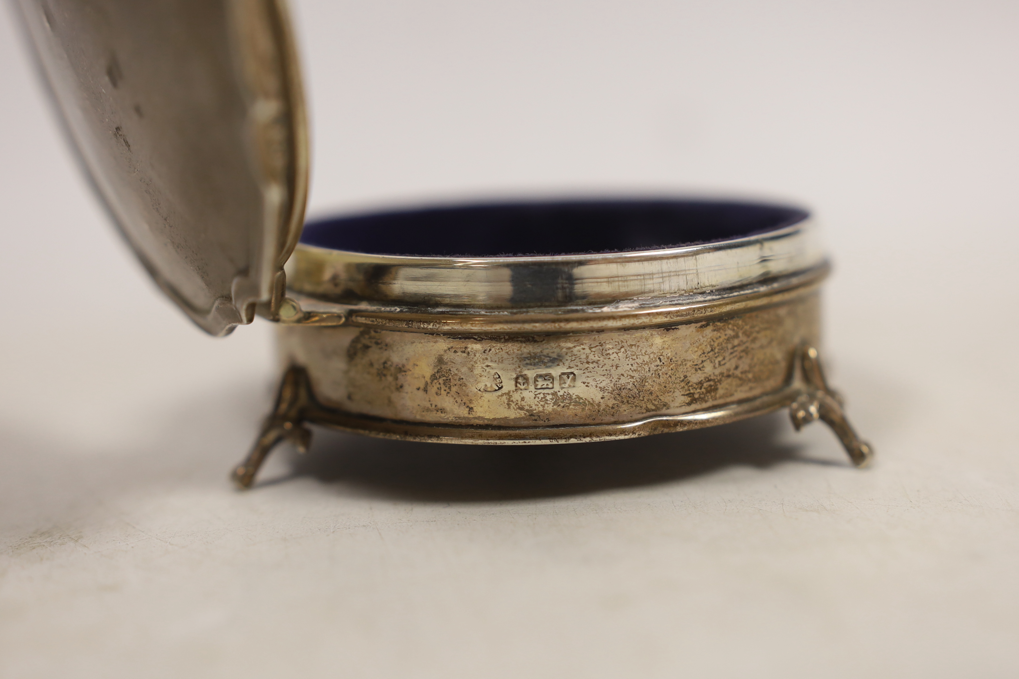 A Victorian silver tobacco box, London, 1873, 76mm and a late silver mounted trinket box.